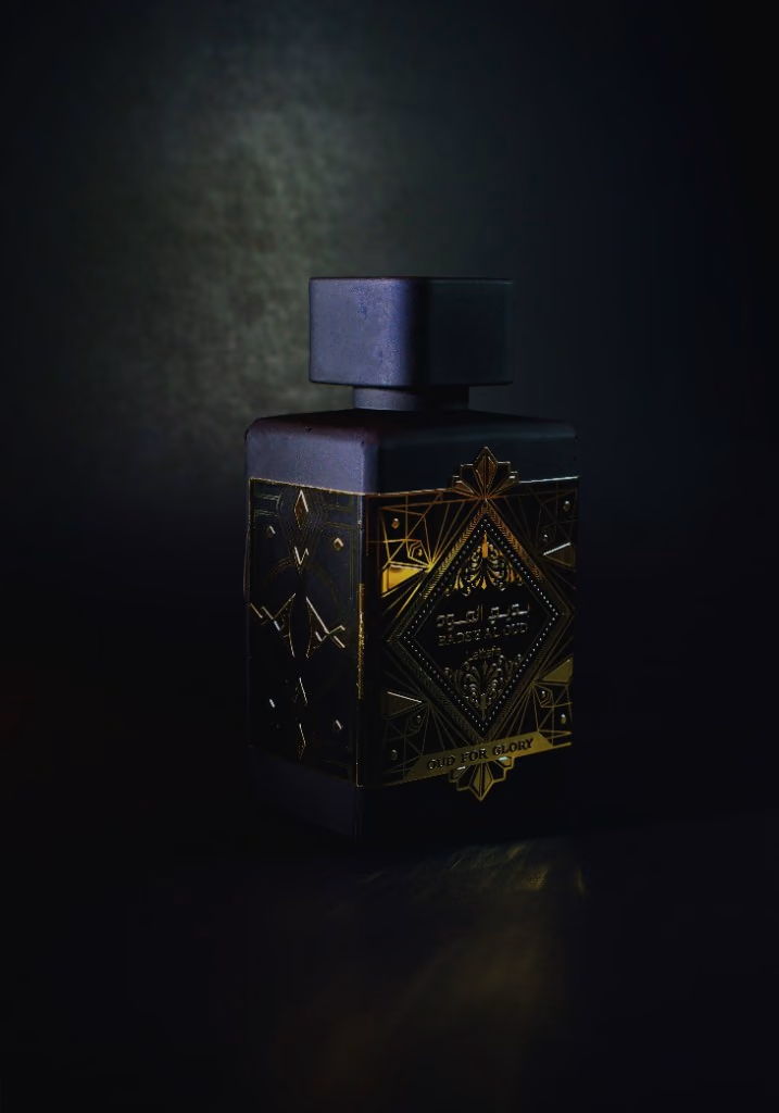 Lattafa Bade’e Al Oud, gold filigree on a black bottle